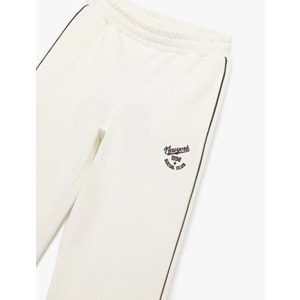 Kadın Giyim Pamuklu Şardonlu Biyeli Baskılı Beli Lastikli Geniş Paça Eşofman Altı - KOTON - 6WAL40045IK - EKRU - M