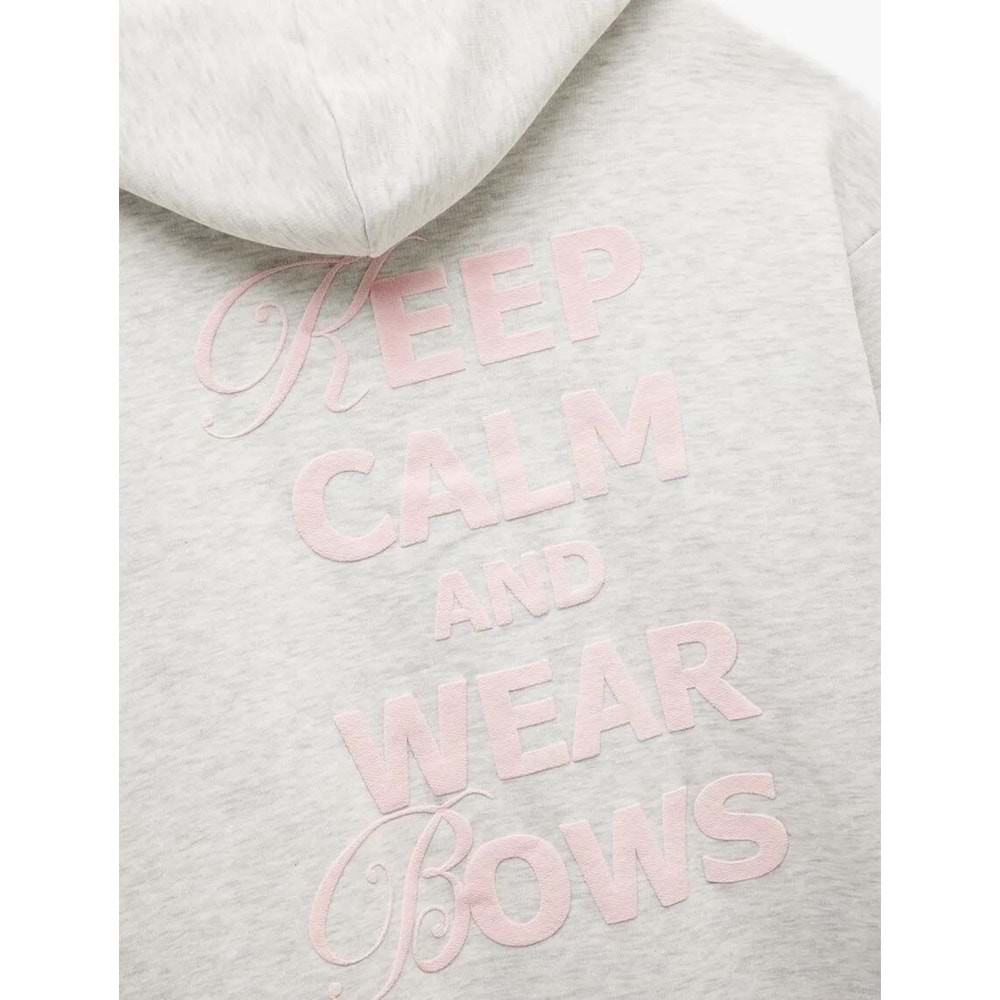 Kadın Giyim Şardonlu Kanguru Cepli Kapüşonlu Fiyonklu Arkası Baskılı Fermuarlı Oversize Sweatshirt - KOTON - 6WAL10228IK - KAR MELANJ - M-L